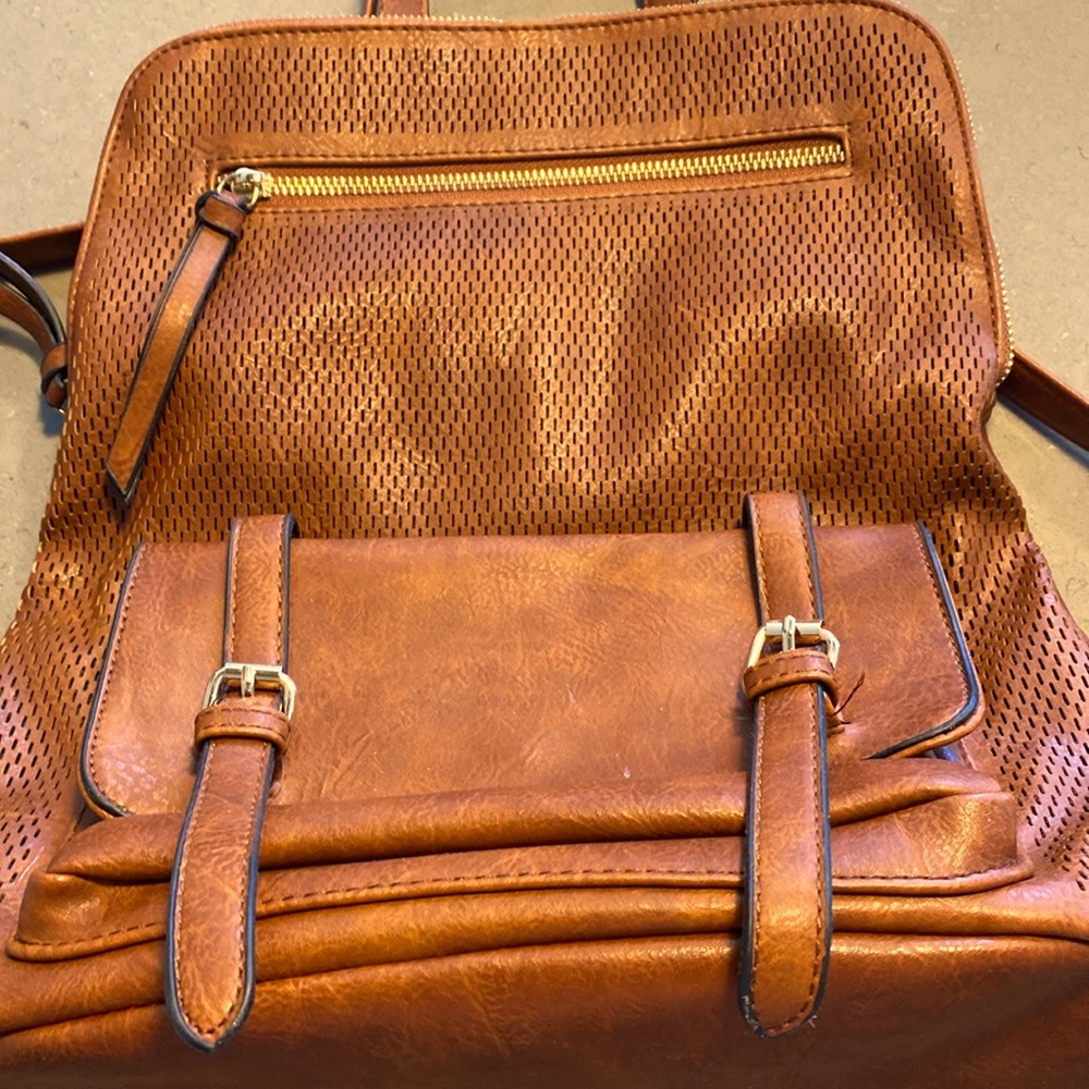Backpack/purse with laptop padded pocket inside and multiple other pockets